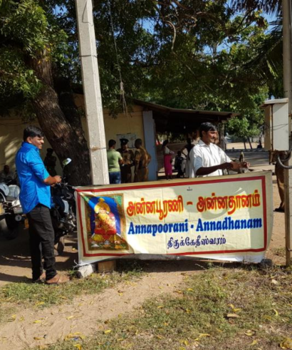 Devotees receiving free meals during annual Annadhanam